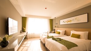 A modern hotel room with a large bed, a desk, a flat-screen TV, and a large window with curtains. - The Mulian Hotel Suzhou Branch (Suzhou)