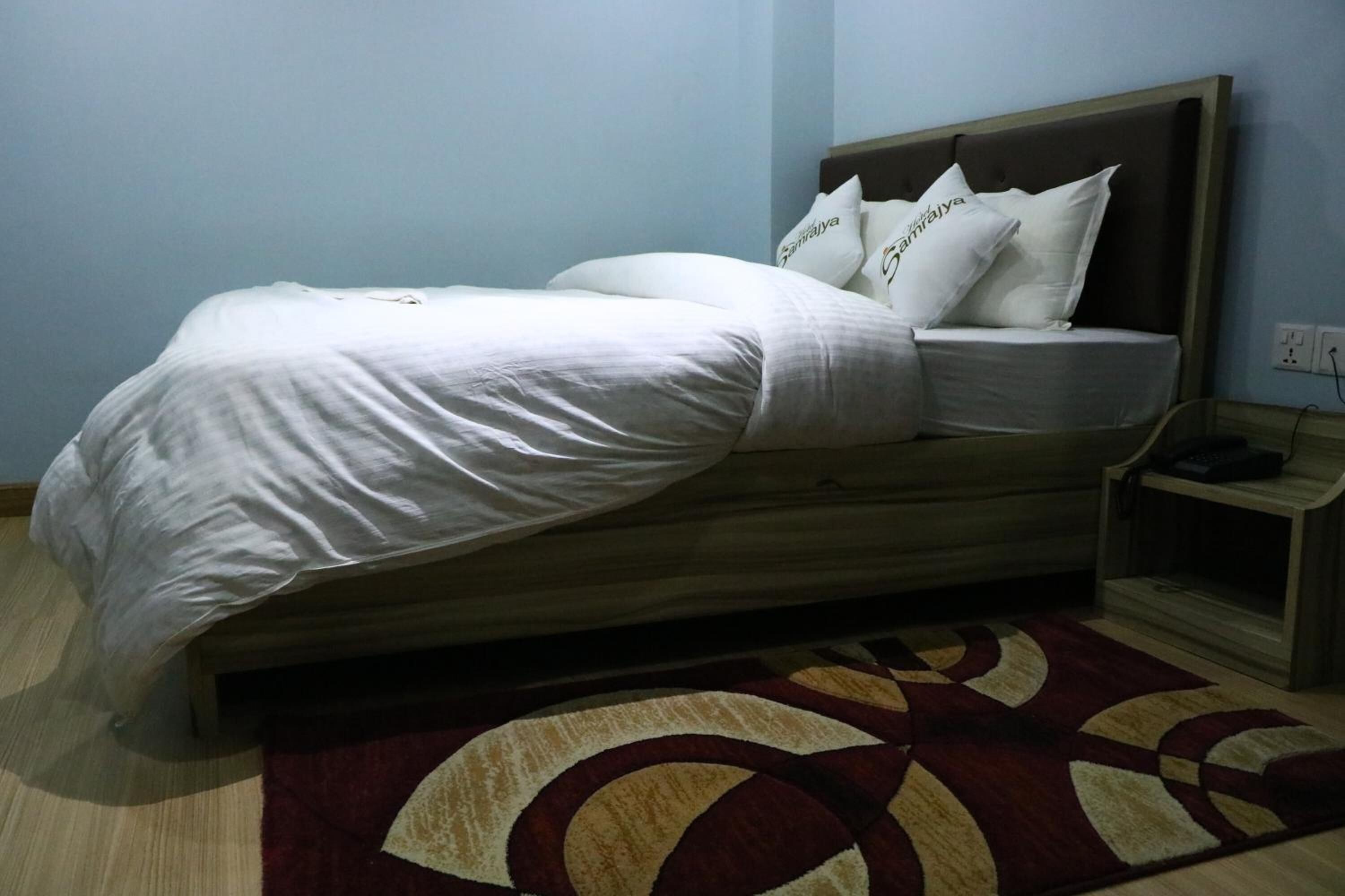 blackout curtains, iron/ironing board, free wifi, bed sheets