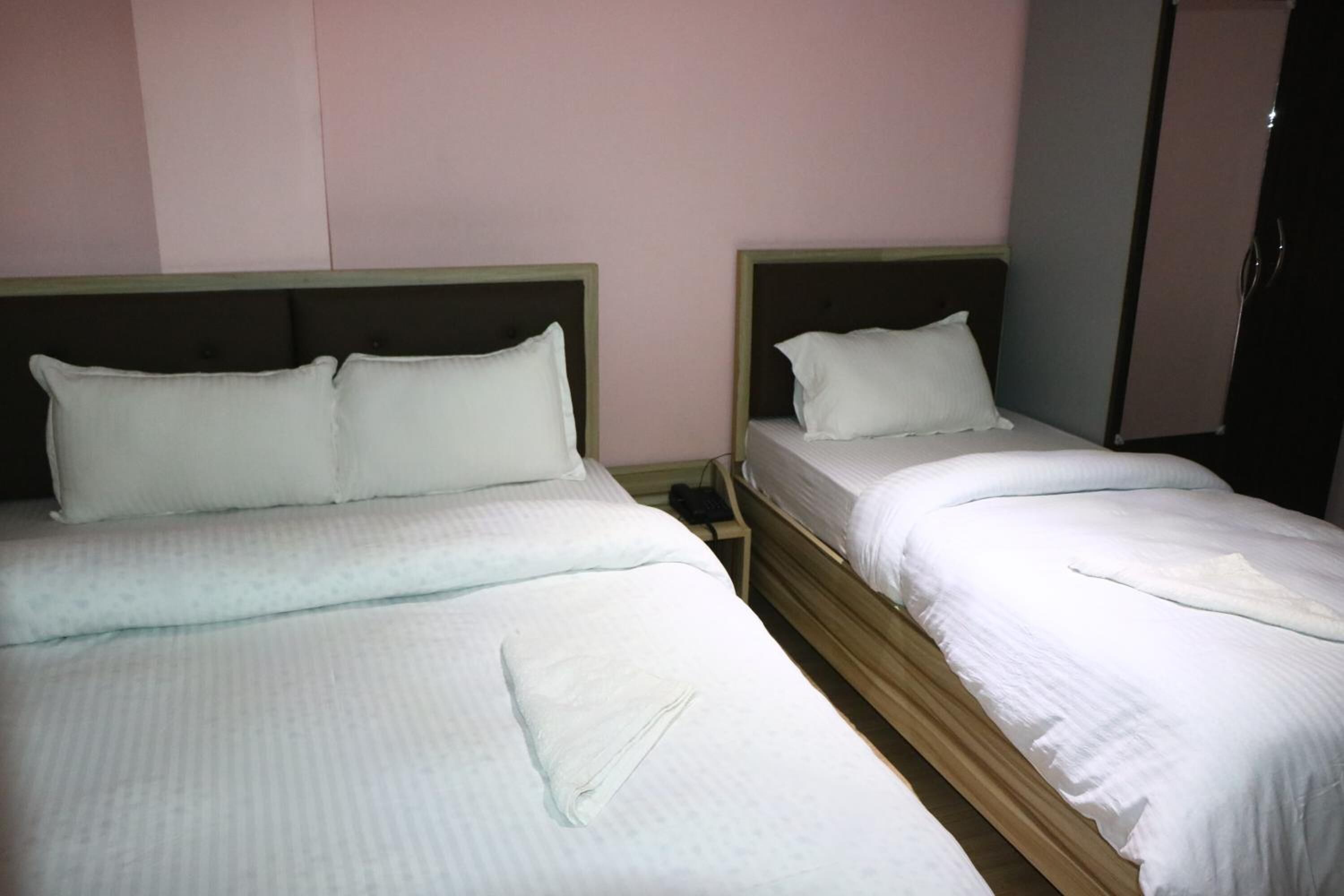 blackout curtains, iron/ironing board, free wifi, bed sheets