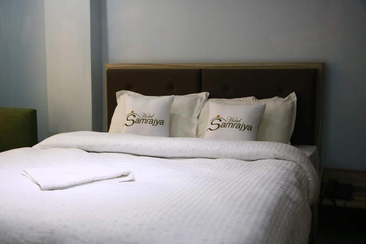 blackout curtains, iron/ironing board, free wifi, bed sheets