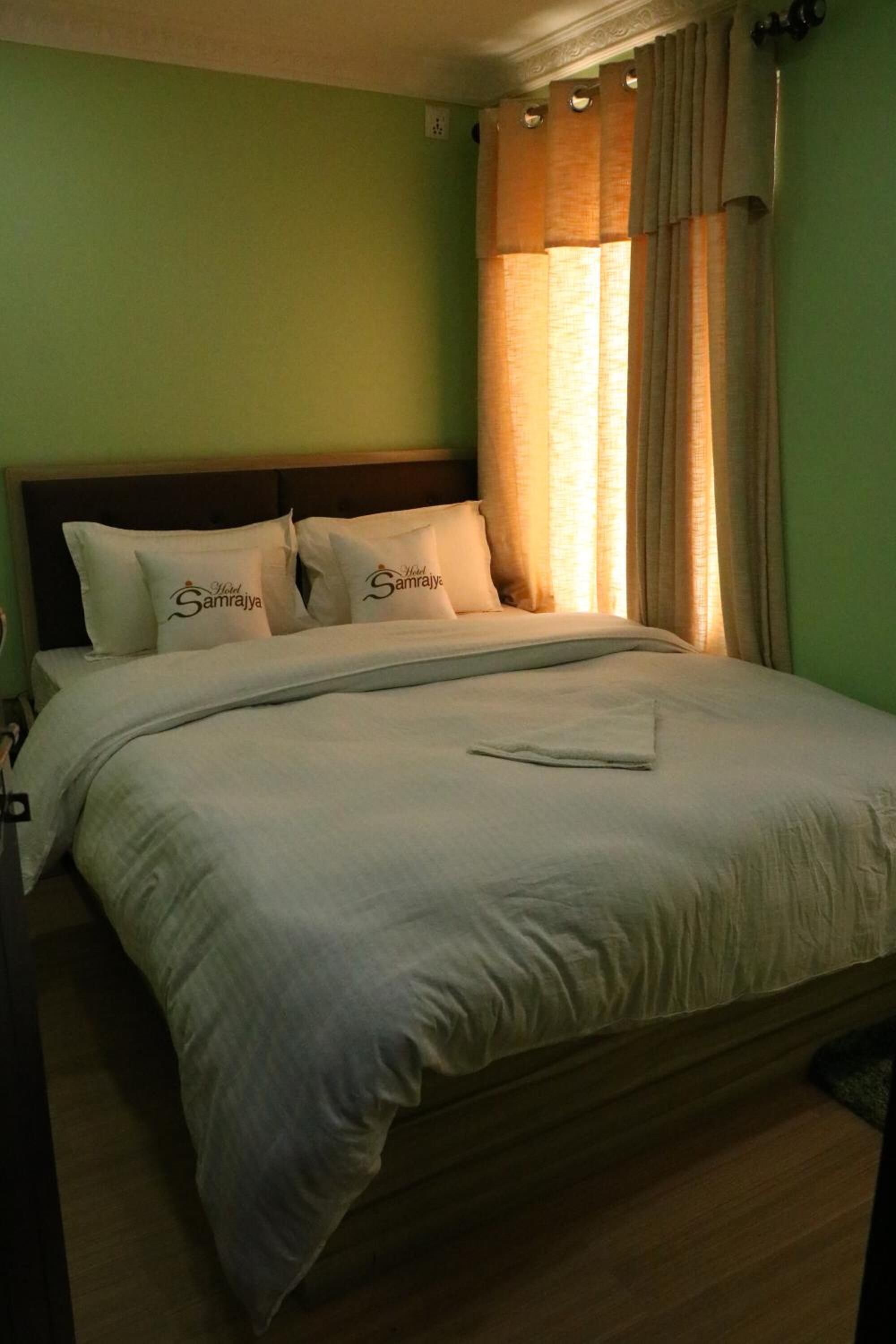 blackout curtains, iron/ironing board, free wifi, bed sheets