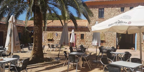 Breakfast, lunch, dinner served; Spanish cuisine, garden views