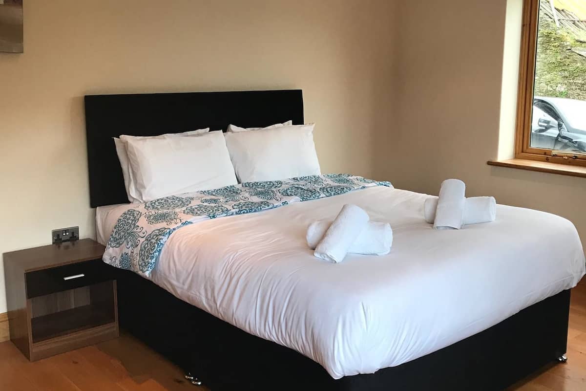 Desk, blackout curtains, iron/ironing board (on request), free WiFi