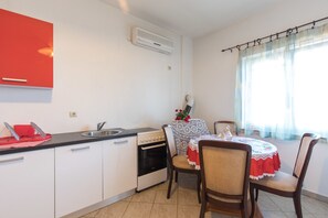 House, 1 Bedroom | Living area | Flat-screen TV - Apartment Lucia & Holiday Home Nino (Opatija)