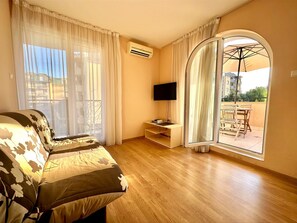 Apartment, 1 Bedroom | Living room | 30-cm flat-screen TV with cable channels, TV - Menada Apartments in Messembria Resort (Sunny Beach)