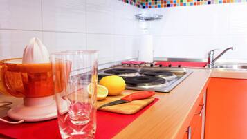 Standard Apartment, Balcony | Private kitchenette | Fridge, stovetop, coffee/tea maker, cookware/dishes/utensils