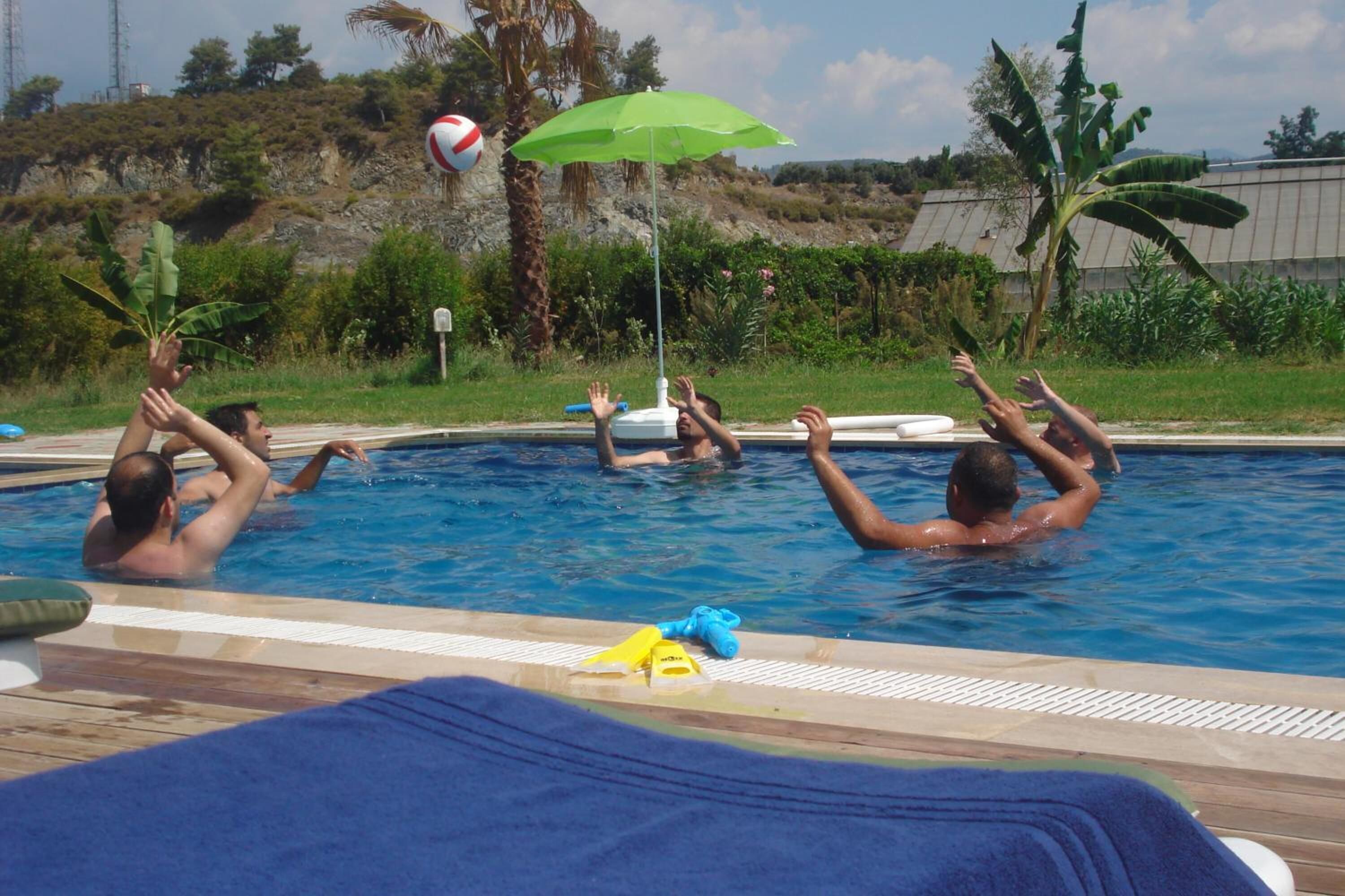 outdoor pool, pool umbrellas, pool loungers