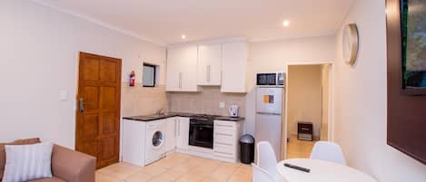 Prestigious Apartments Down Stairs | Private kitchen | Coffee/tea maker, electric kettle