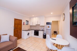Prestigious Apartments Down Stairs | Private kitchen | Coffee/tea maker, electric kettle - Prestigious Apartments (Randburg)