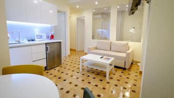 Apartment, 1 Bedroom (Modern 1BR Flat) | Living area | Smart TV