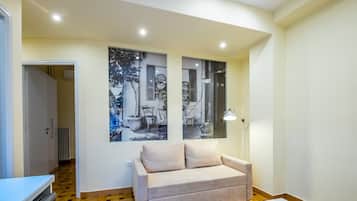 Apartment, 1 Bedroom (Modern 1BR Flat) | Living area | Smart TV