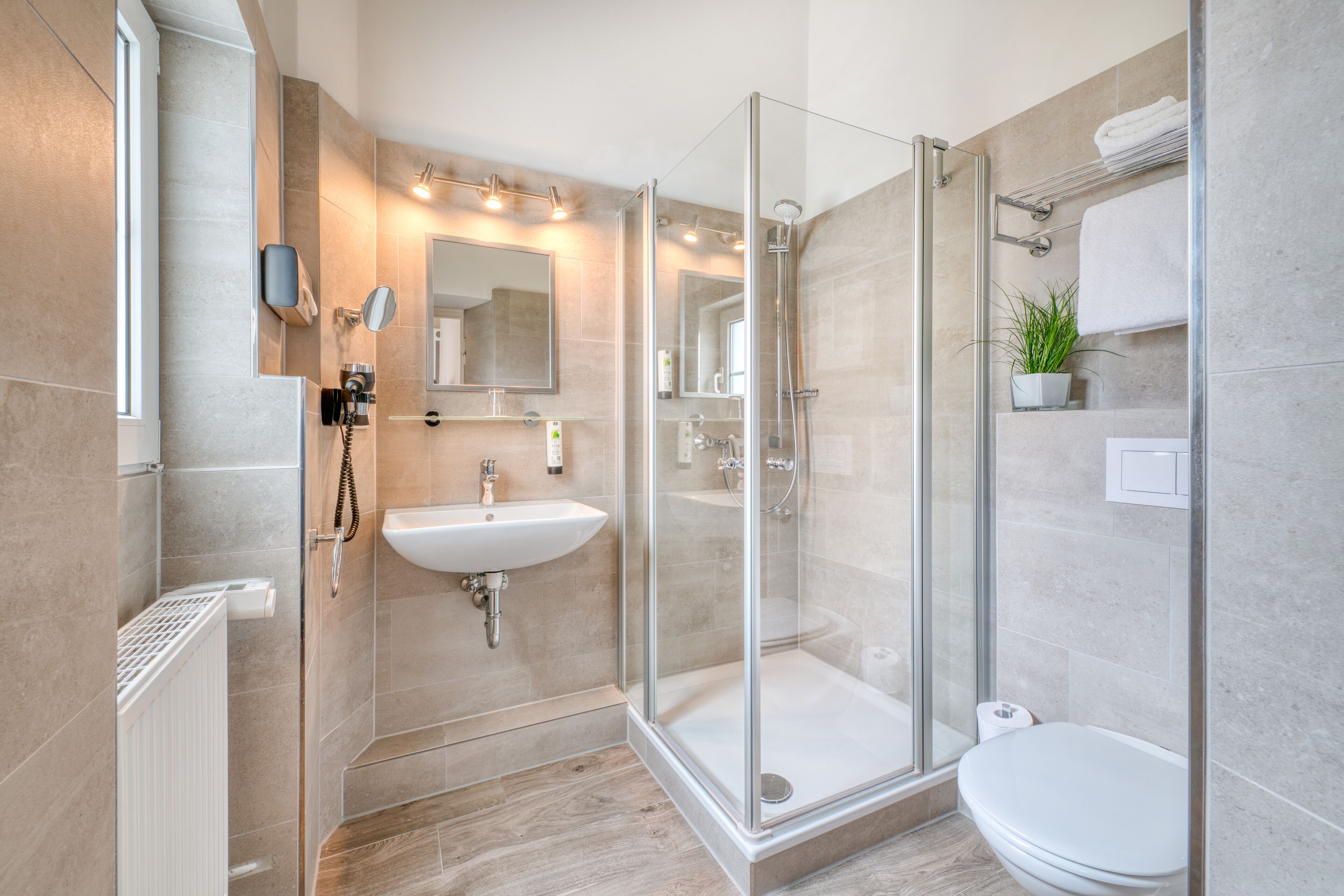 classic single room | bathroom | shower, hair dryer, towels