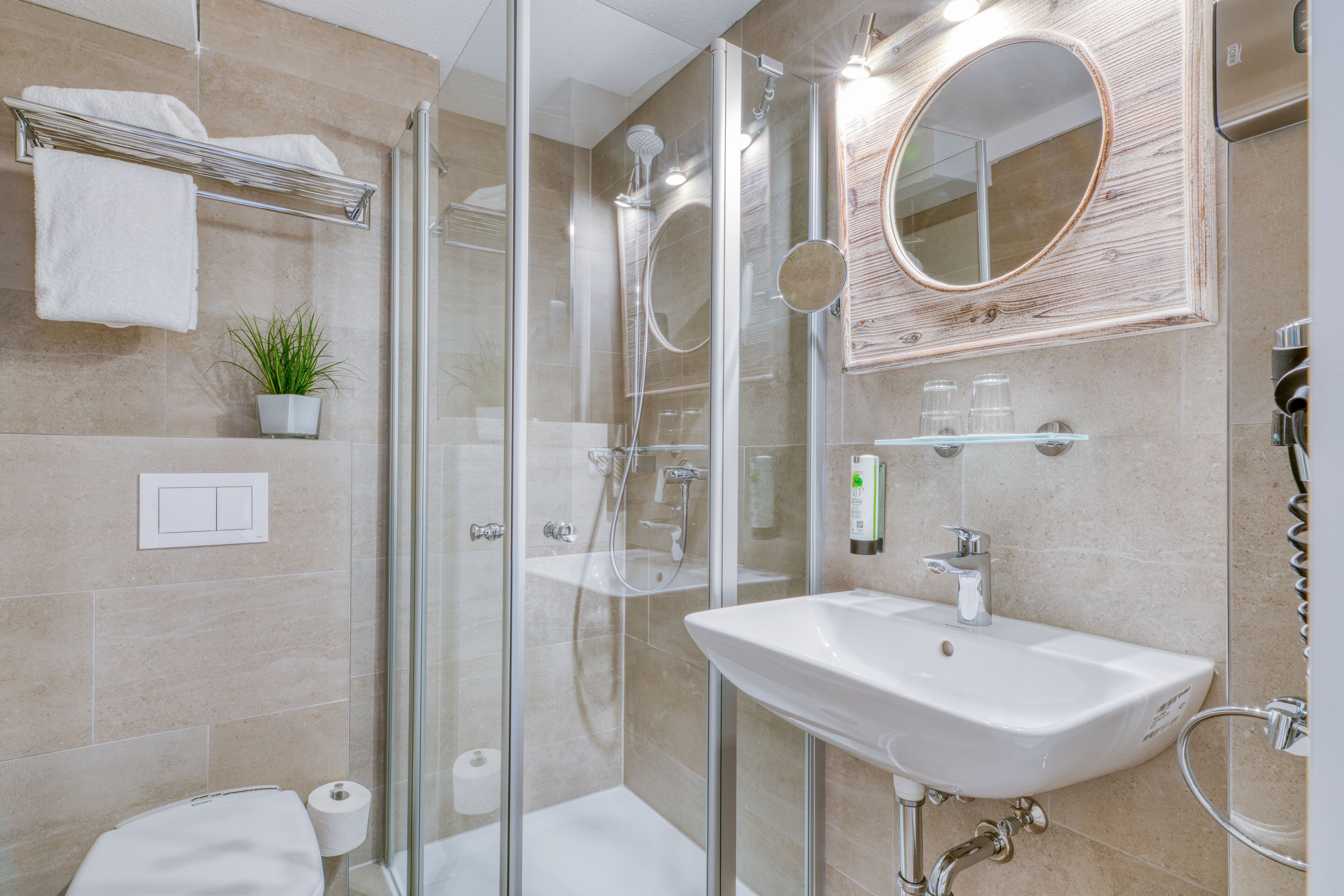 classic double room | bathroom | shower, hair dryer, towels