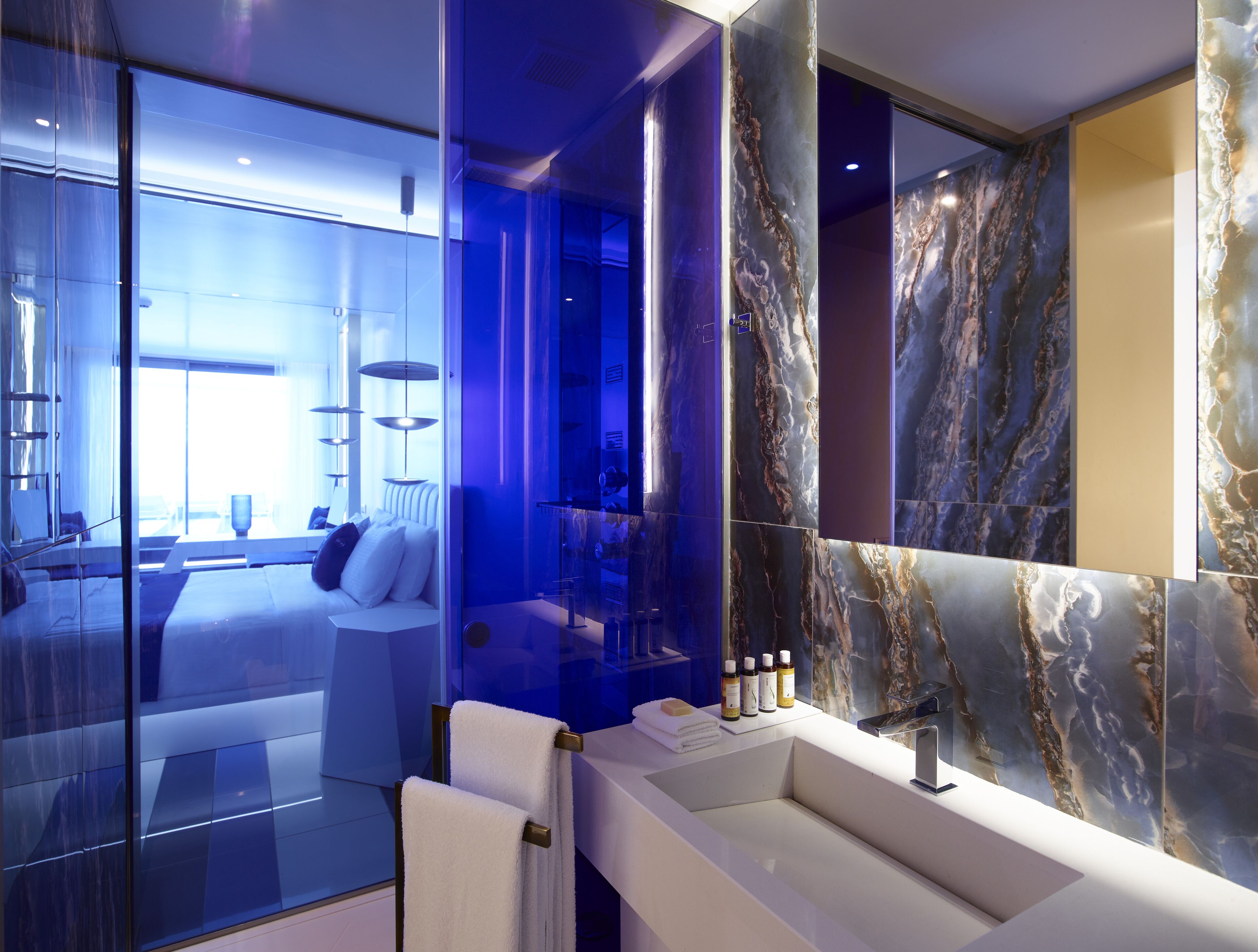 gold junior suite sea view | bathroom | designer toiletries, hair dryer, bathrobes, slippers