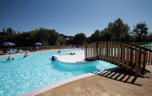 Seasonal outdoor pool, pool umbrellas, pool loungers