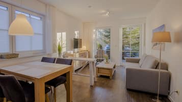 Apartamento, no piso térreo | Edredons de pluma, frigobar, cortinas blackout, quartos à prova de som