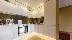 Deluxe Apartment | Private kitchen | Coffee/tea maker, fridge, microwave, oven - Hilltop Apartments - City Centre Foorum (Tallinn)