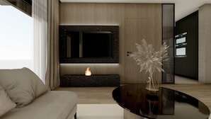 A modern living room with a sofa, a fireplace, and a decorative plant on a coffee table. - Villa M (Split)
