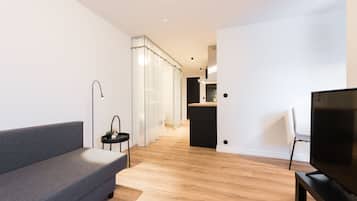 Apartment, 1 Bedroom | Living area | Smart TV, Netflix, heated floors