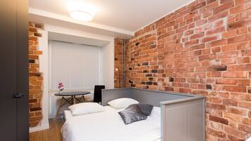 Economy Studio | Laptop workspace, blackout drapes, soundproofing, iron/ironing board