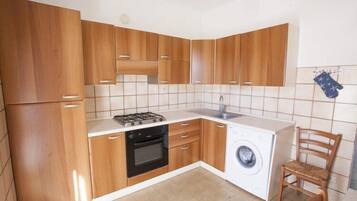 Apartment, 2 Schlafzimmer | Eigene Küche | Großer Kühlschrank, Ofen, Herdplatte, Kochgeschirr/Geschirr/Besteck