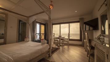 Deluxe Room, 1 King Bed, Balcony, Ocean View | Premium bedding, in-room safe, individually furnished, free WiFi