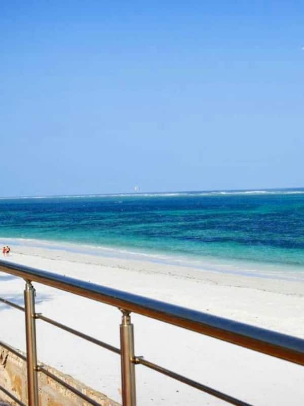 On the beach, white sand, sun loungers