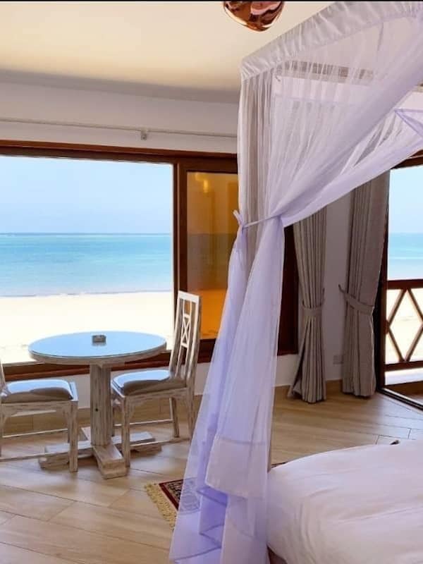 Deluxe Room, 1 King Bed, Balcony, Ocean View | 4 bedrooms, premium bedding, in-room safe, individually furnished