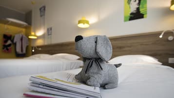 Hypo-allergenic bedding, pillow-top beds, in-room safe, desk