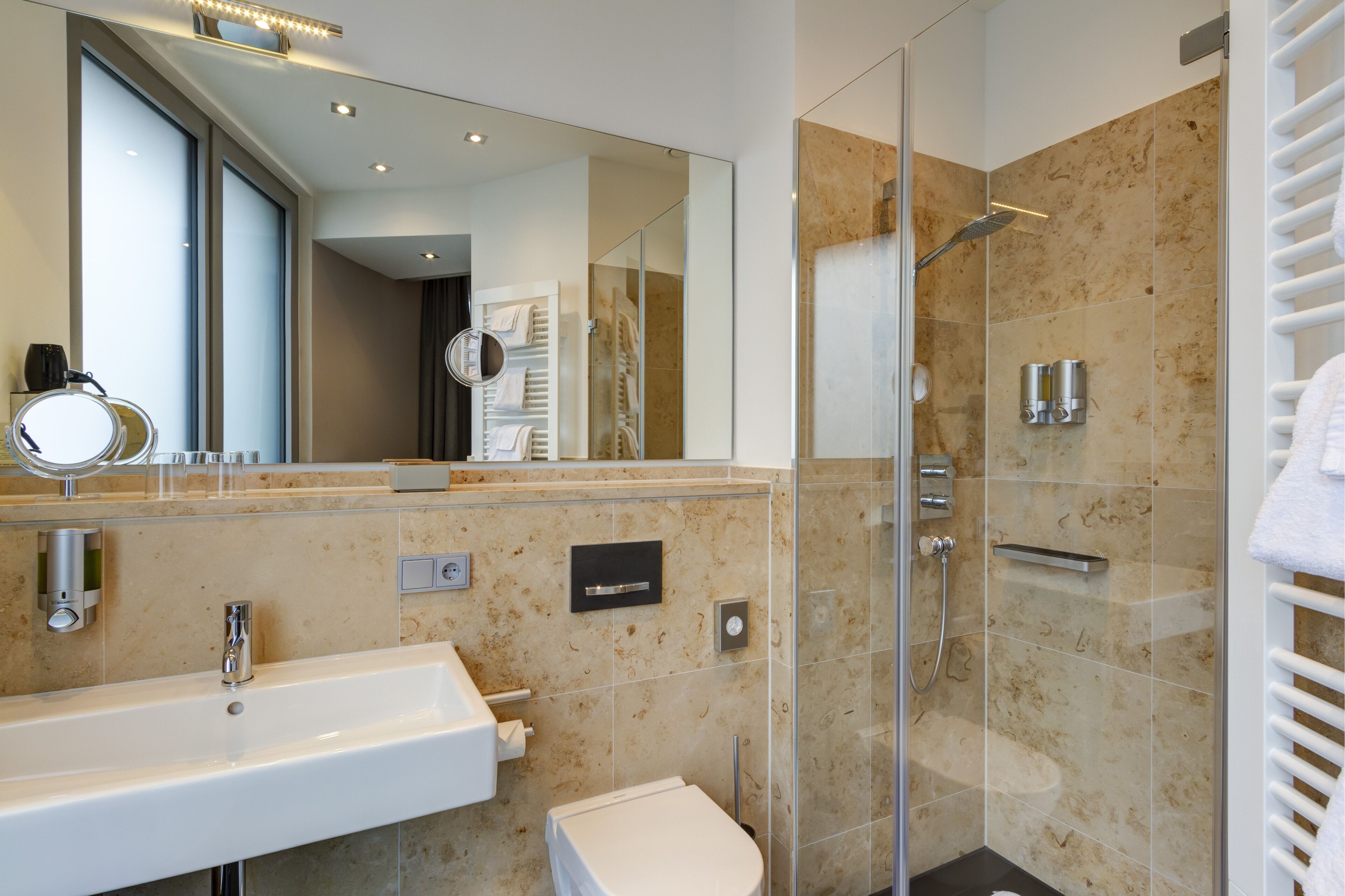 shower, free toiletries, hair dryer, towels