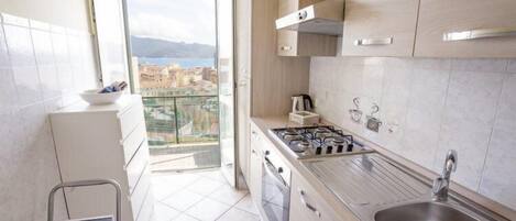 Apartment, 1 Schlafzimmer | Eigene Küche | Großer Kühlschrank, Ofen, Herdplatte