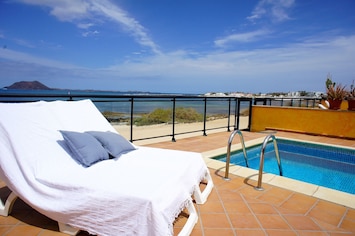 Pool sun deck & beach door