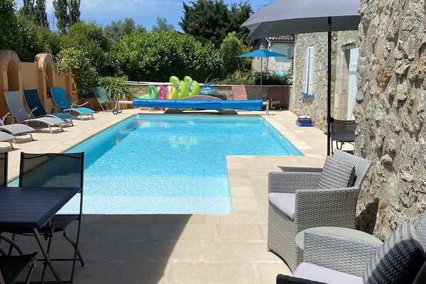 Seasonal outdoor pool, open 11:00 AM to 8:00 PM, pool umbrellas