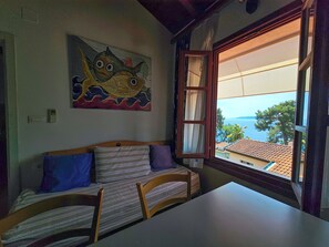 Luxury Apartment, 1 Bedroom, Sea View | Living area | Flat-screen TV