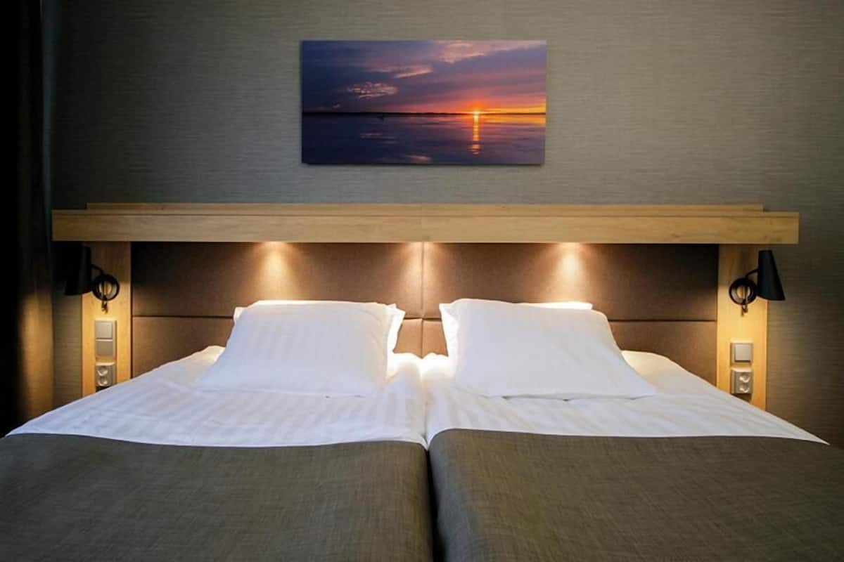 blackout curtains, soundproofing, iron/ironing board, free wifi