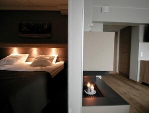 Rideaux occultants, chambres insonorisées, fer et planche à repasser