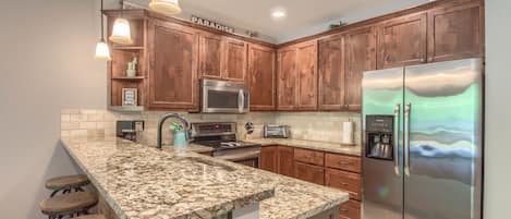 Condo, 2 Bedrooms | Private kitchen | Fridge, microwave, oven, stovetop