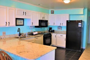 Fridge, dishwasher, coffee/tea maker