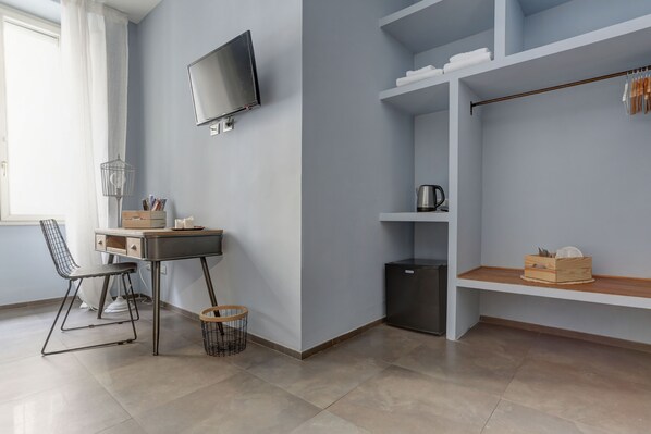 Chambre Triple (2) | Coin séjour | Télévision à écran plat