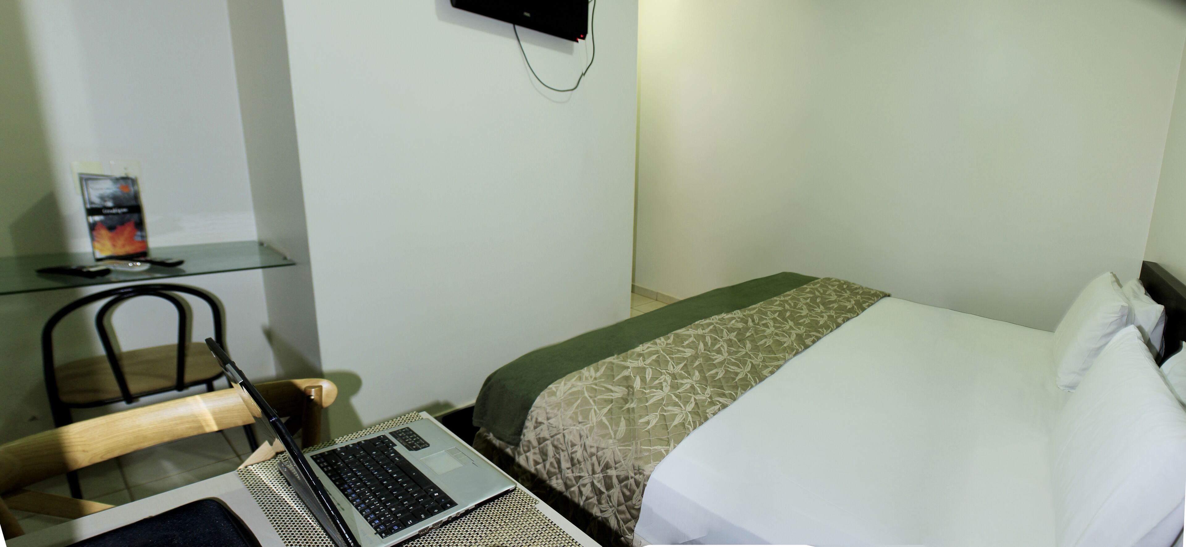 economy double room, 1 queen bed | minibar, desk, blackout curtains, iron/ironing board