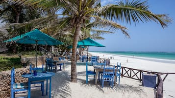 On the beach, white sand, beach umbrellas