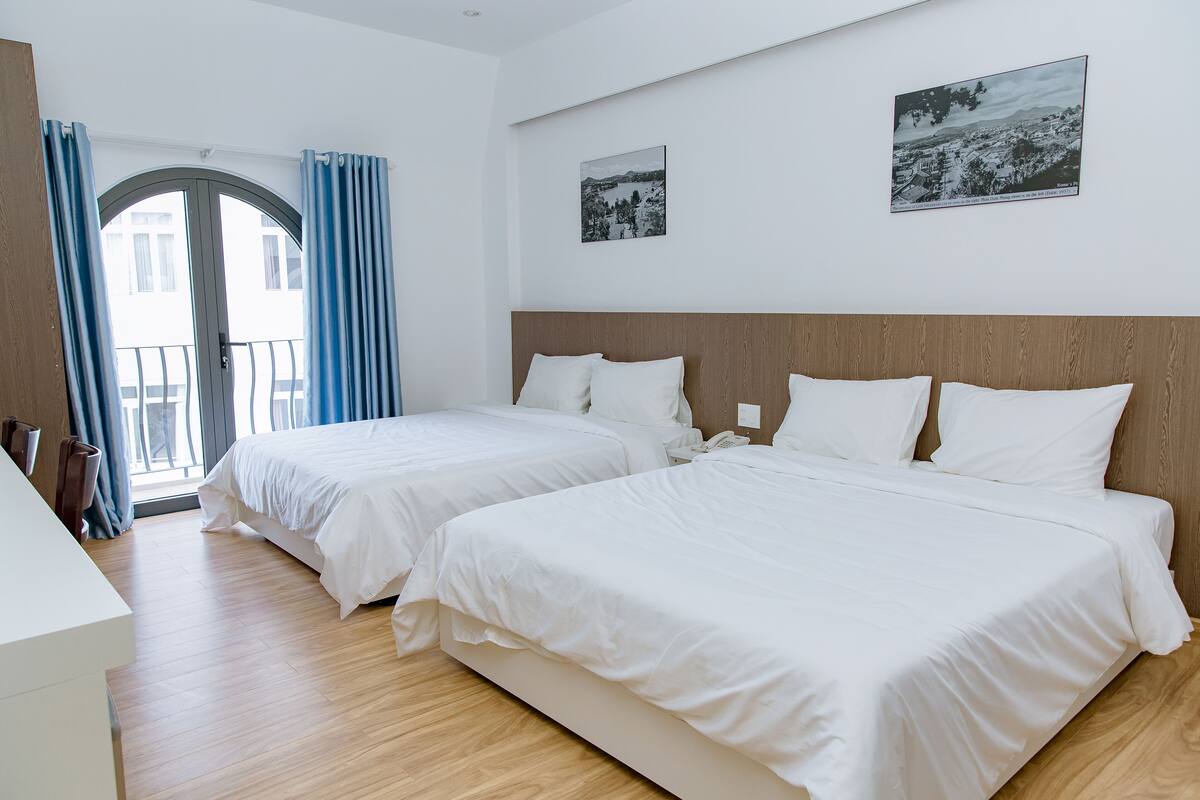 Minibar, desk, blackout curtains, iron/ironing board