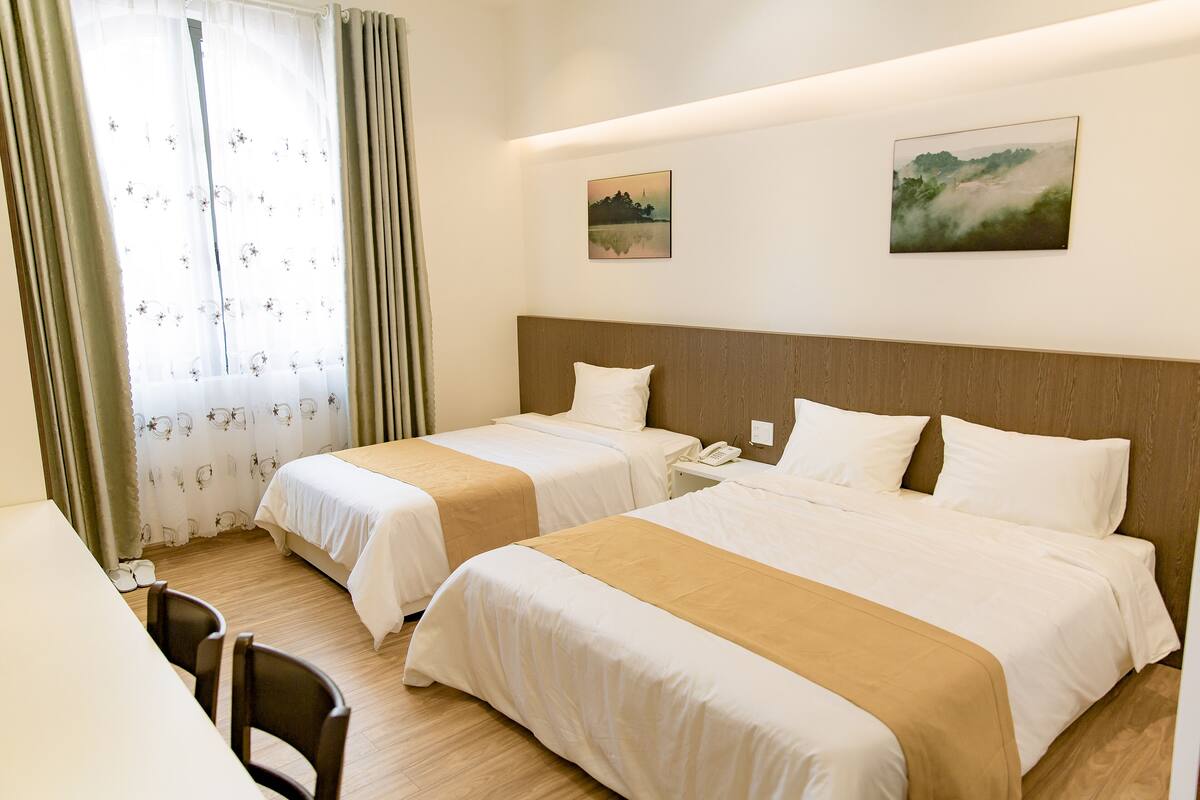 Minibar, desk, blackout curtains, iron/ironing board