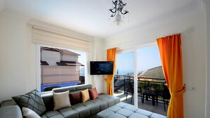 Villa, 2 chambres | Aire de séjour | Téléviseur ACL