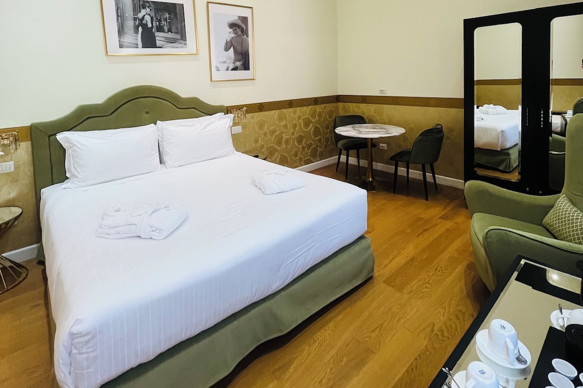 Quadruple Room | Bathroom | Shower, free toiletries, hair dryer, bathrobes