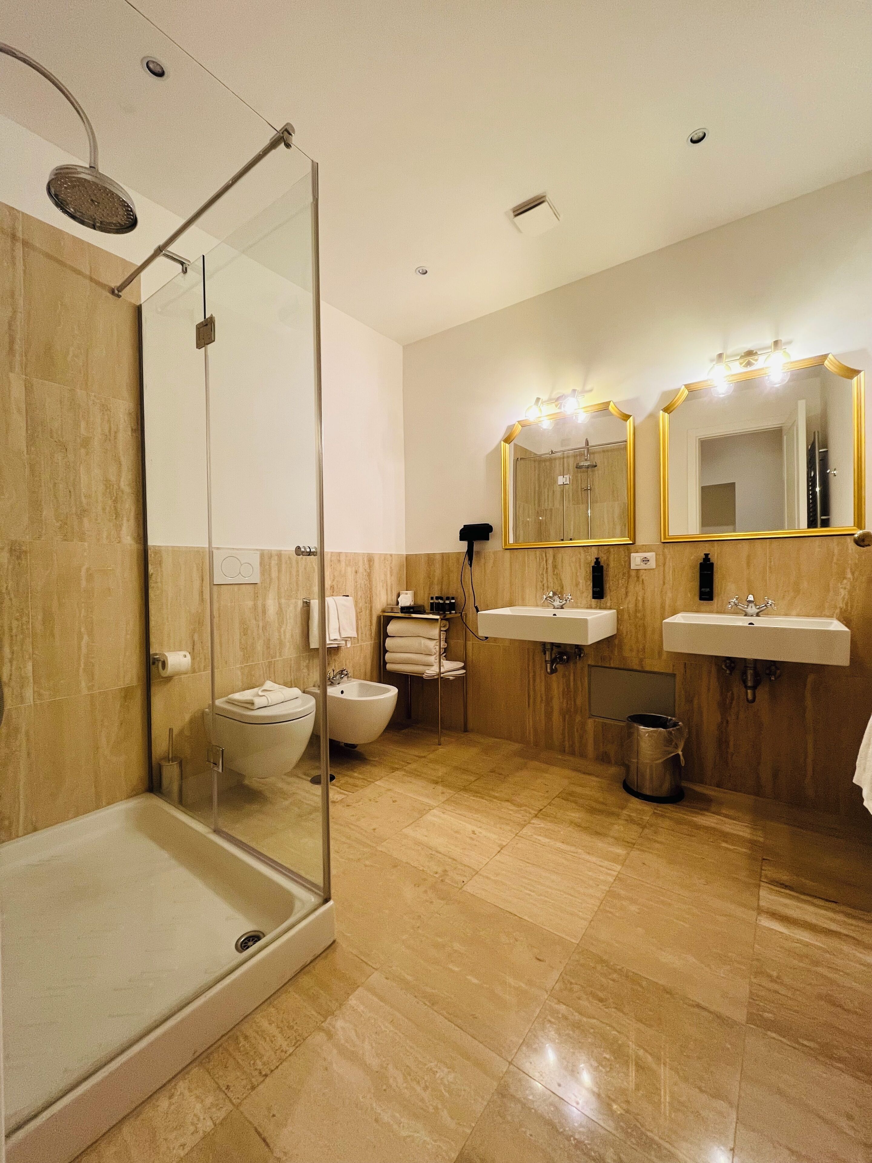quadruple room | bathroom | shower, free toiletries, hair dryer, bathrobes
