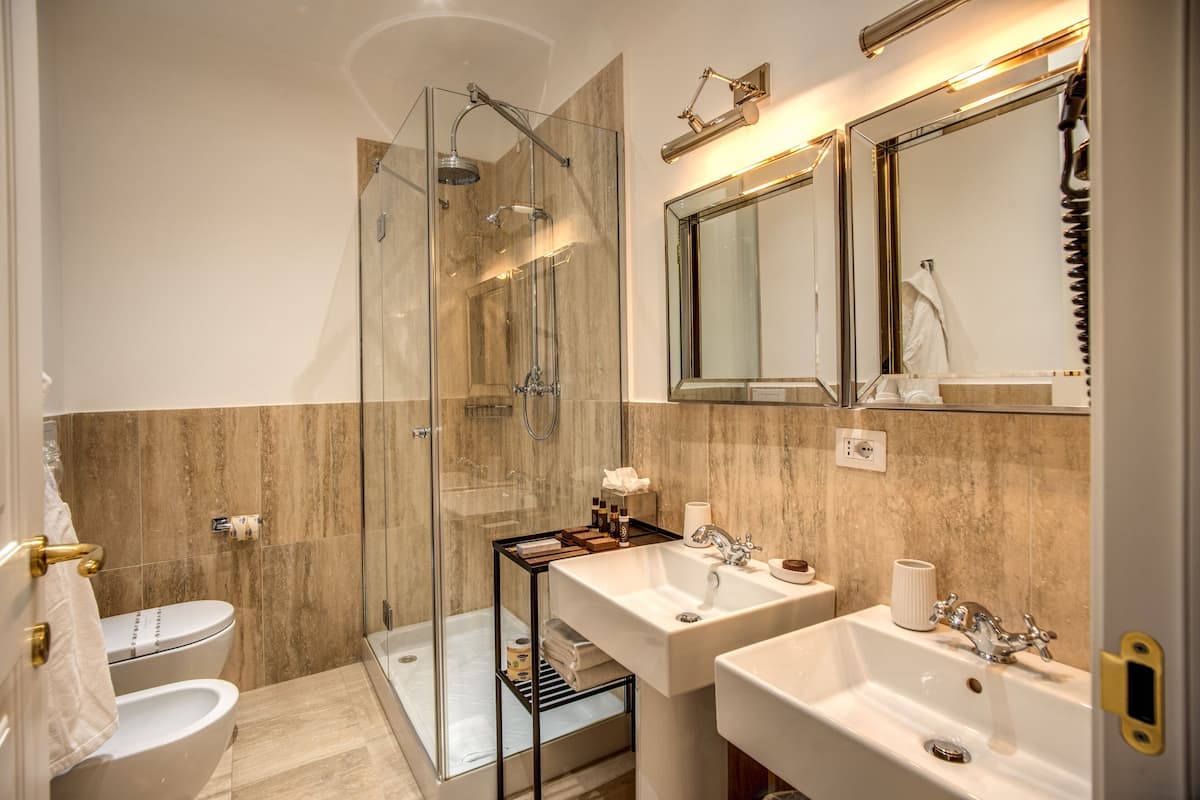 Shower, free toiletries, hair dryer, bathrobes