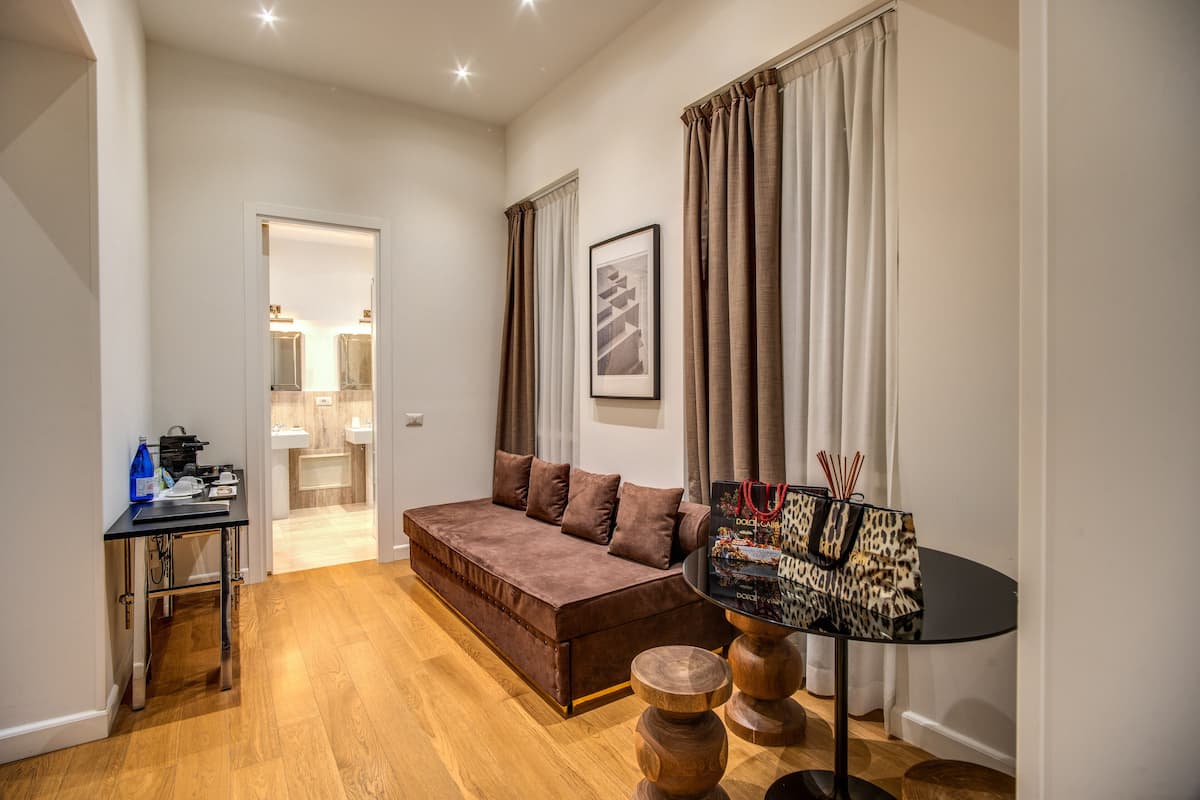 Suite | Down comforters, in-room safe, individually decorated