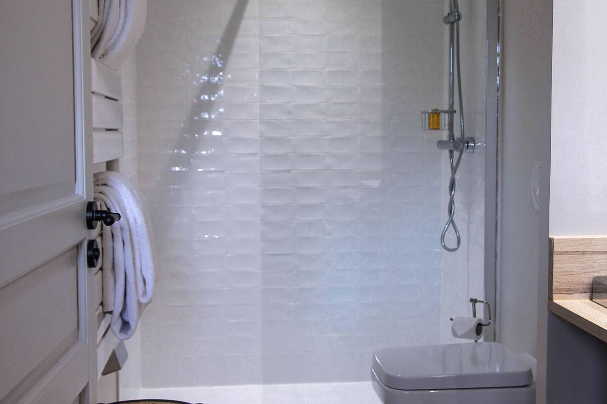 cottage, non smoking (private) | bathroom | rainfall showerhead, hair dryer, bathrobes, slippers