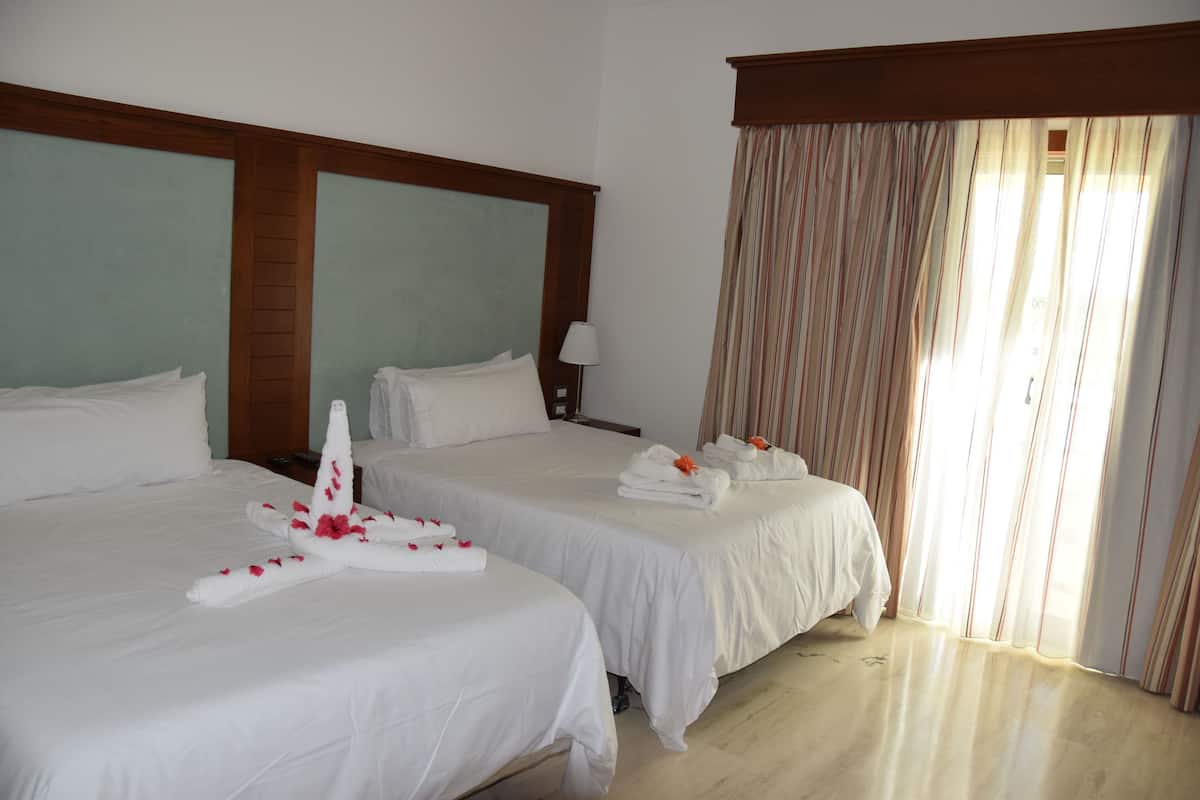 2 habitaciones, edredón, camas Select Comfort y minibar